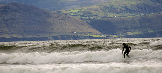 Person surfing at Inch Strand Co. Kerry by Jonathan Hession 2005