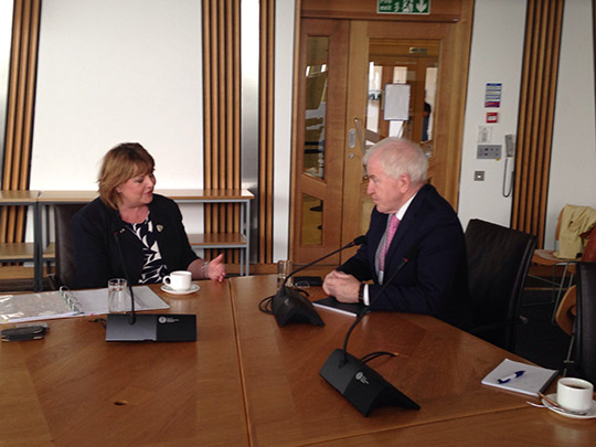 Minister Deenihan and Cabinet Secretary Hyslop discuss Irish-Scottish cooperation.