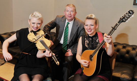 Consul General Pat Bourne with St. Patrick's Day musicians.