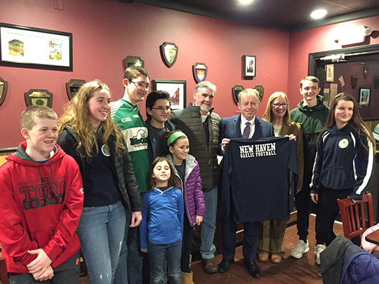 Minister Cannon with New Haven Gaelic football shirt Minister Cannon with New Haven Gaelic football shirt