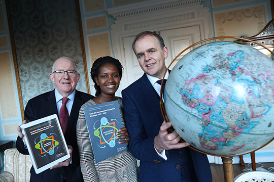 Ministers Charlie Flanagan and Joe McHugh with Justine Nantale at the launch of the Irish Aid Development Education Strategy.