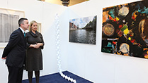 Minister Hayes and Minister Creighton viewing some of the art work.