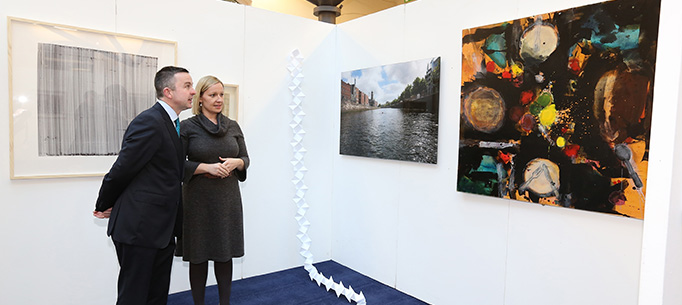 Minister Hayes and Minister Creighton viewing some of the art work. 