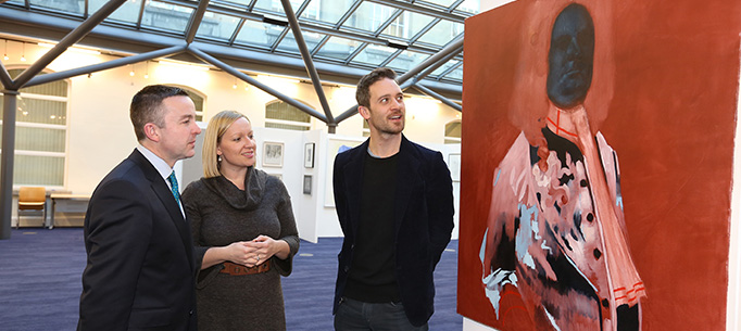 Minister Hayes and Minister Creighton viewing some of the art work. 