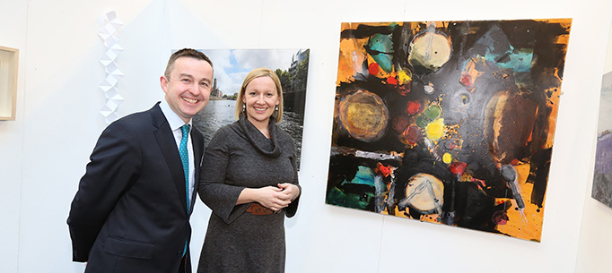 Minister Hayes and Minister Creighton viewing some of the art work. 