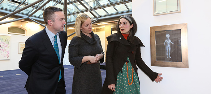 Minister Hayes and Minister Creighton viewing some of the art work. 