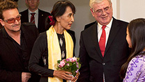 Visit of Aung San Suu kyi to Ireland. The Tanaiste and Minister for Foreign Affairs and Trade, Eamon Gilmore, TD greets Aung San Suu Kyi this afternoon at Dublin Airport.
Also pictured are Bono and Sophia Kelly, aged 12.
