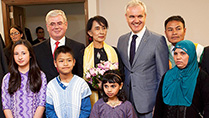 Visit of Aung San Suu kyi to Ireland
The Tanaiste and Minister for Foreign Affairs and Trade, Eamon Gilmore, TD greets Aung San Suu Kyi this afternoon at Dublin Airport. Three children prensented flowers to Aung San Suu Kyi, from left Sophia Kelly, Saw Pu, Laila Bgum with thir parents, Saw Tun, Hamida Begum, Anngsun Phyo, also pictured is Colm O'Gorman, Director, Amensty Intenational Ireland.