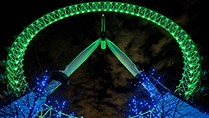 The London Eye at night lit green to celebrate St Patrick's Day