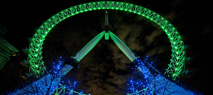 The London Eye at night lit green to celebrate St Patrick's Day