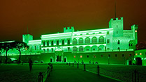 The Princes Palace in Monaco lit green at night to celebrate St Patrick's Day
