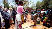 President Michael D Higgins and his wife Sabina viewing the water well while on a visit to Saopampeni Village in the Salima District, Malawi. Photo Chris Bellew / Fennell Photography 2014