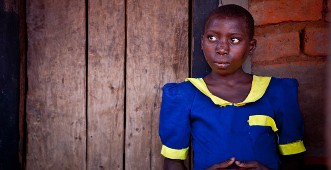 President Michael D Higgins and his wife Sabina visited the home of Ms. Nakhirita Chinsewu and her children, her daughter is pictured, where they heard from Ms. Chinsewu about her experiences as a social participant on a social cash transfer programme while on a visit to Saopampeni Village in the Salima District, Malawi. Photo Chris Bellew / Fennell Photography 2014