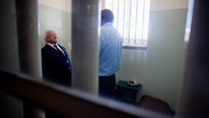 Pictured is President Michael D Higgins with Thulani Mabaso, a political prisioner at Robben Island from 86-91 , in Nelson Mandela's Cell during a visit to Robben Island, Cape Town, on the nineteenth day of the Presidents 22 day official visit to Ethiopia, Malawi and South Africa.Photo Chris Bellew / Fennell Photography 2014