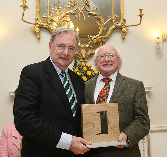 Honorary Consul General to New Zealand, Mr Rodney Walshe, receiving the Presidental Distinguished Service Award from President Michael D. Higgins. 26th November 2013. Pic: Mac Innes Photography