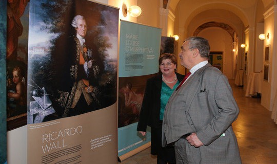 Ambassador Alison Kelly with former Foreign Minister Karel Schwarzenberg viewing the Strangers to Citizens exhibition at St. Patrick’s Day Reception 2013, Břevnov Monastery, Prague