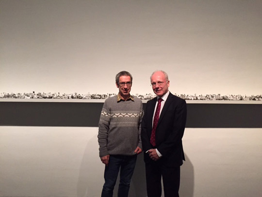 Ambassador Ó Floinn greets Irish artist Tom Molloy at Demonstrating Minds Exhibition