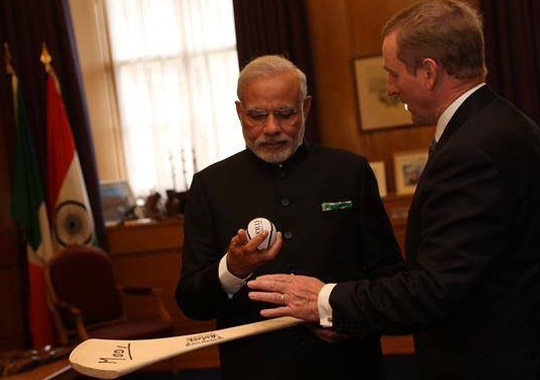 PM Modi received a hurley and sliothar, used in Ireland's national sport, hurling, from Taoiseach Enda Kenny