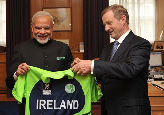 PM Modi joins Team Ireland - the Prime Minister receives an Ireland cricket jersey from Taoiseach Enda Kenny