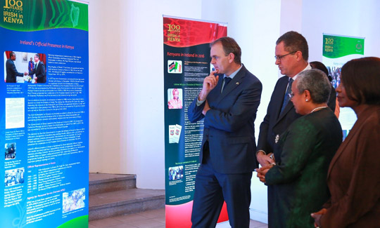 L-R: Minister McHugh, Ambassador O’Neill, First Lady Margaret Kenyatta, and Cabinet Secretary, Environment and Natrural Resources, Professor Judi Wakhungu view one of the Irish in Kenya exhibits at the National Museum, Nairobi. Photo: B Inganga