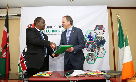 Cabinet Secretary for Education, Dr Fred Matiangi and Minister McHugh shakes hands on signing of Young Scientists Kenya MoU. Photo: B. Inganga