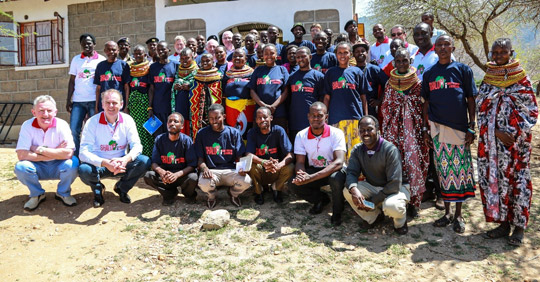 Minister McHugh and Fr Patrick Devine(left), Shalom Centre for Conflict Resolution (SCCR) with local Tuum community and Irish Embassy visitors. Photo: B Inganga