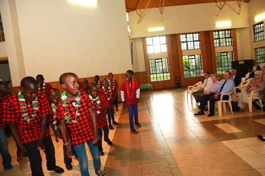 Nyumbani children provide entertainment for Minister McHugh and delegation. Photo: B Inganga