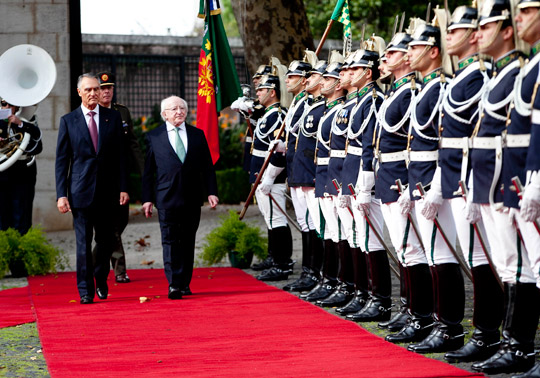 President Higgins and President Cavaco Silva inspect the guard at the Presidential Palace in Belém
