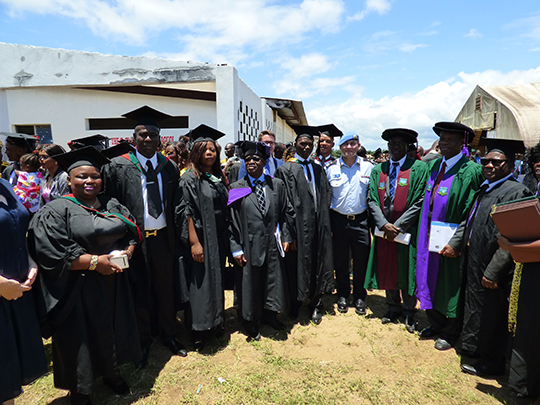 Pictured: UNMIL UN Police Commissioner, Gregory Hinds (centre right), representatives of the Ghana Institute of Management and Administration (GIMPA), and graduates from Liberia’s law enforcement agencies.