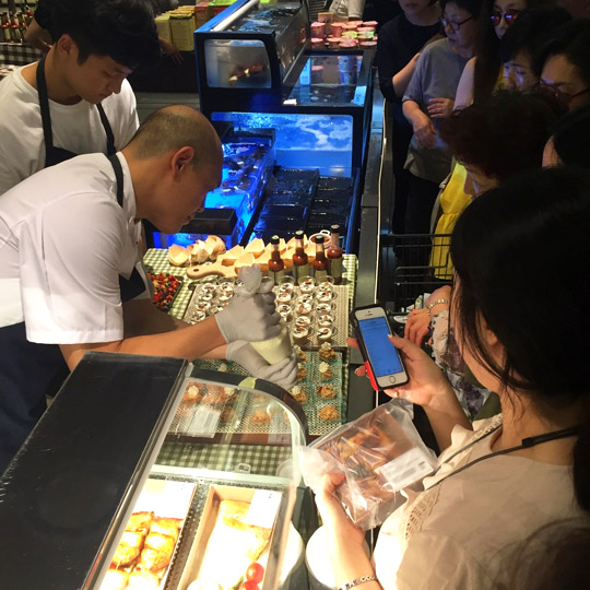 Head chef prepares samples of Irish food for customers