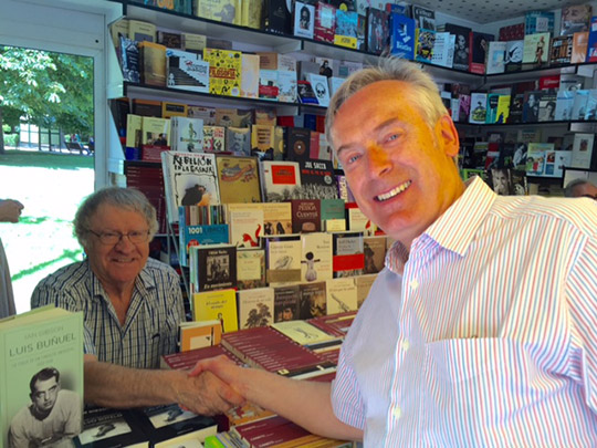 Ambassador Cooney greeting hispanista Ian Gibson at the Madrid Book Fair.