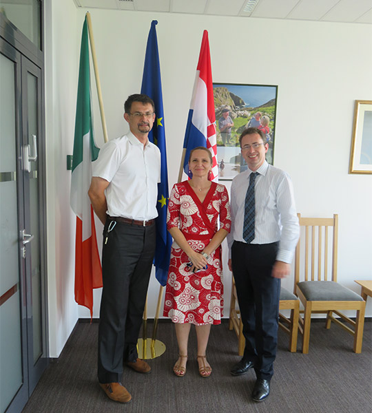 Ambassador Tim Harrington with embassy members, Kristina Szabo and Bernard Vrban