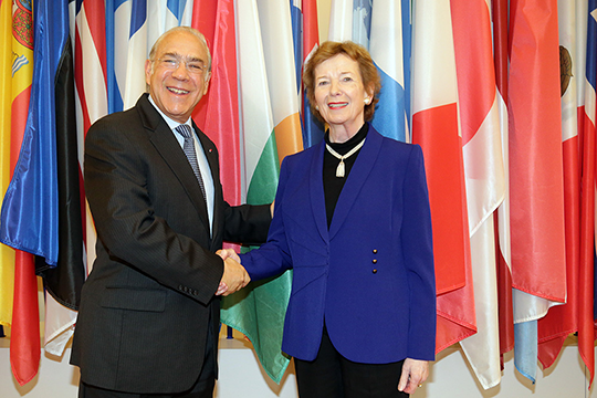 Former President Mary Robinson is greeted by Secretary-General of the OECD Angel Gurría. Photo credit: Organisation for Economic Cooperation and Development