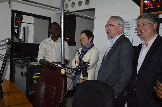 SG Niall Burgess, DG Michael gaffey and Ambassador Gilsenan admire DJ Edwin Bashir of community radio station Ebony FM in Iringa.