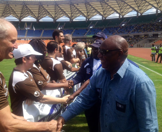 Ambassador Gilsenan plays soccer for peaceful elections