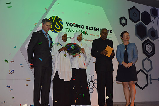 Ambassador Gilsenan pictured with Vice President of Tanzania, Dr Mohamed Ghairb Bilal and the winners of YST 2014, Dhariha Amour Ali and Salma Khalfan Omar