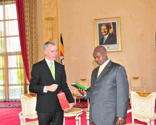 Ambassador Donal Cronin presenting HE President Y.K. Museveni with a gift