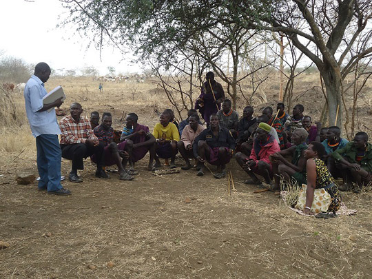 Kraal leaders discussing HIV and AIDS, Karamoja