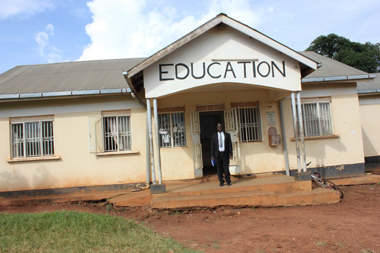 Dan Bubale, extreme left, with two of his colleagues in the Education Department