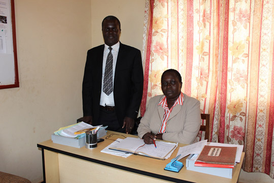 Dan Bubale with the District Education Officer