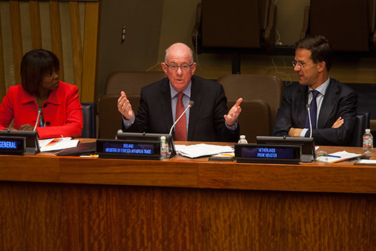 Charles Flanagan, Minister for Foreign Affairs and Trade, Ireland, speaks at the Delivering Zero Hunger – Demonstrating Impact High Level Side Event, as Ertharin Cousin, left, Executive Director of the United Nations World Food Programme, and Mark Rutte, right, Prime Minister of the Netherlands, look on, at the United Nations in New York, U.S., on Thursday, September 25, 2014. (c) Michael Nagle